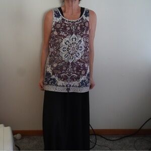 Elegant Sleeveless Top with Intricate Pattern